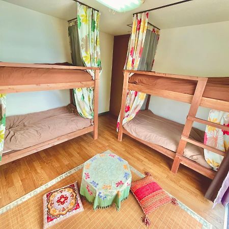 Guest House Waraemon Nago Exterior foto